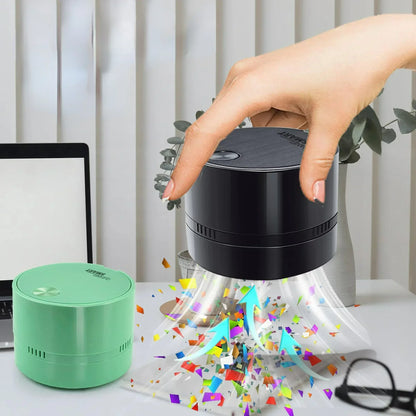 Portable mini desktop vacuum cleaner in various colors – ideal for cleaning desks, keyboards, and small surfaces.